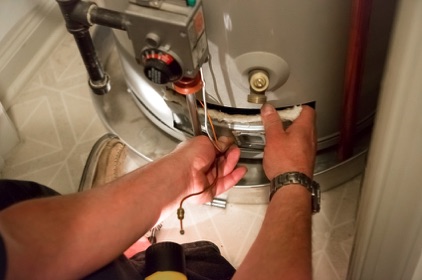 Plumbing Repair on hot water tank by Global Heating Services in Sherwood Park